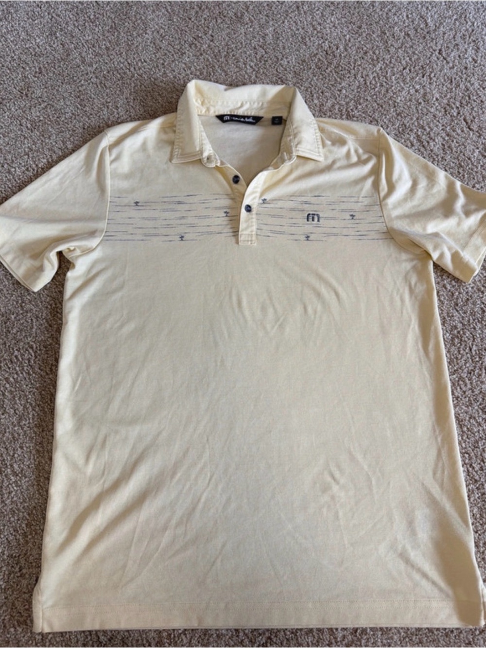 Travis Mathew Men's Light Yellow Polo with Subtle Stripe Detail